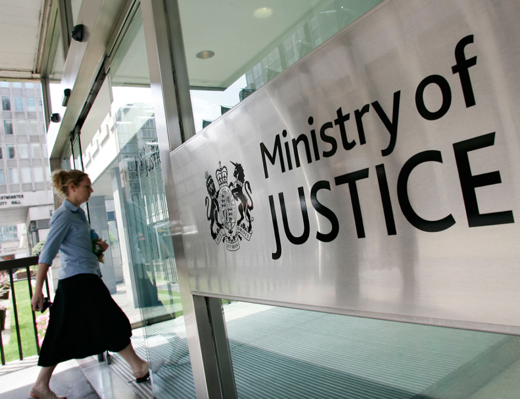 Photo showing a woman entering Ministry of Justice building