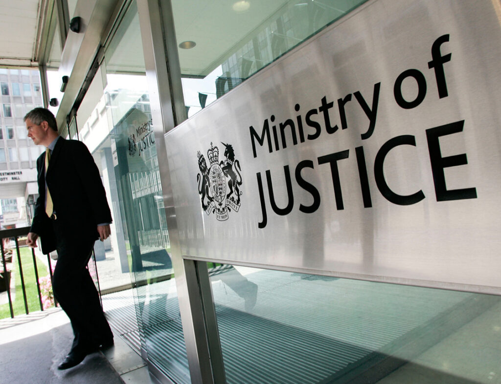 Photo showing a man leaving the Ministry of Justice