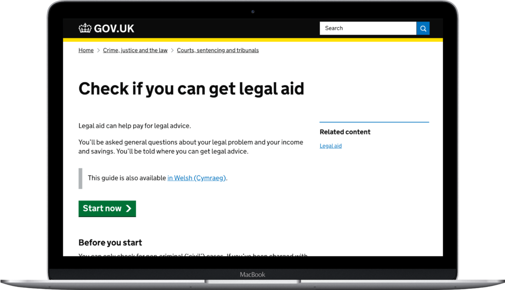 Photo of laptop displaying check if you can get legal aid website