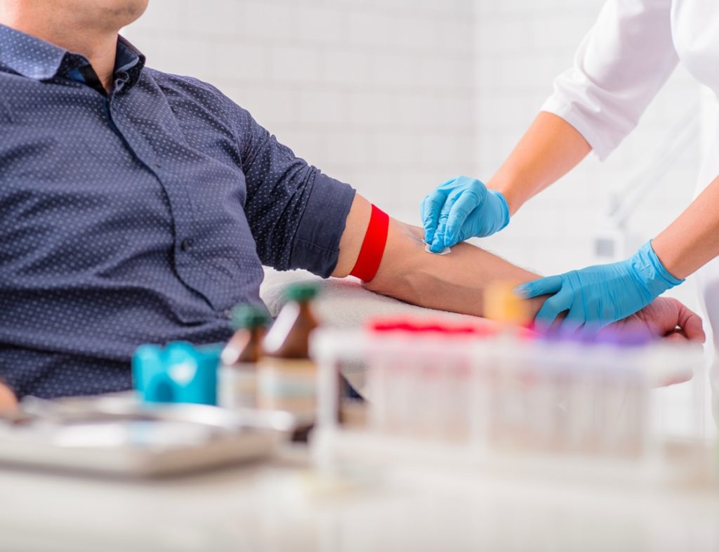 Photo showing a man receiving a vaccine