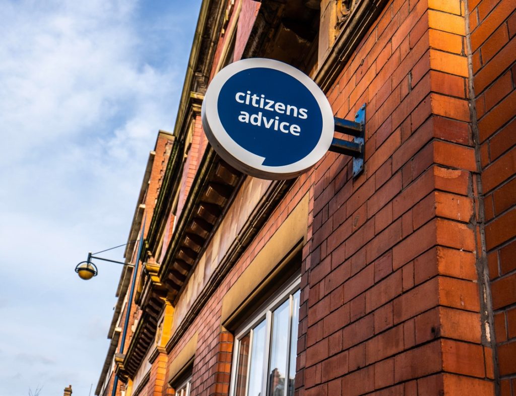 Photo of building with a sign saying 'citizens advice'