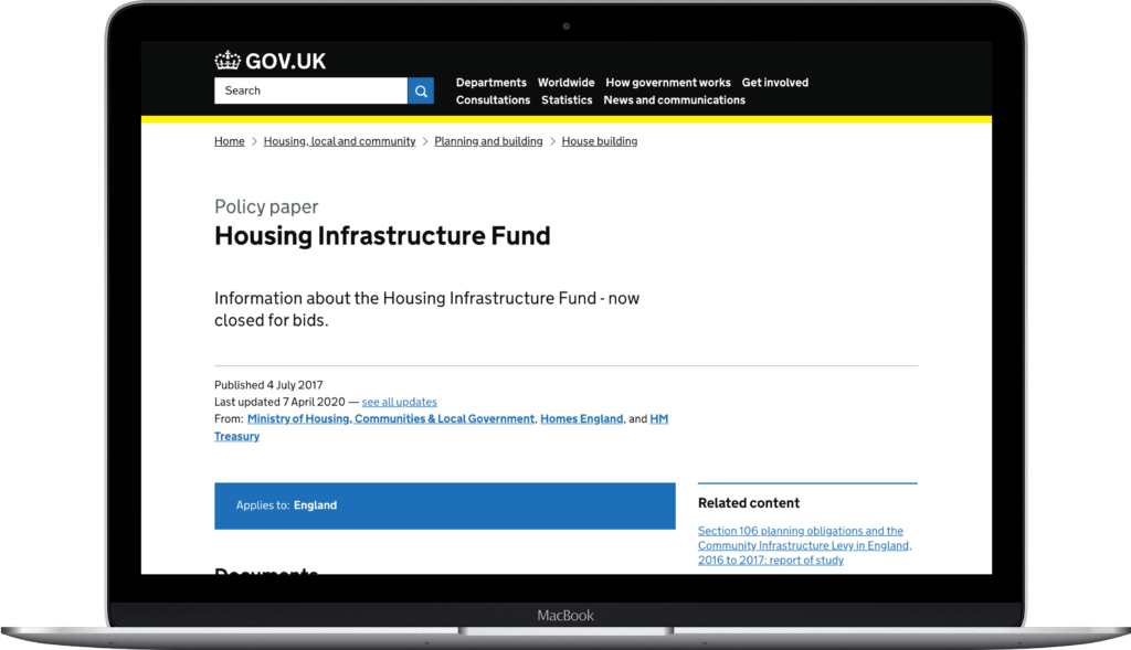 Photo of a laptop displaying Housing Infrastructure Fund site