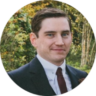 Image showing man smiling in suit and tie outside in front of trees