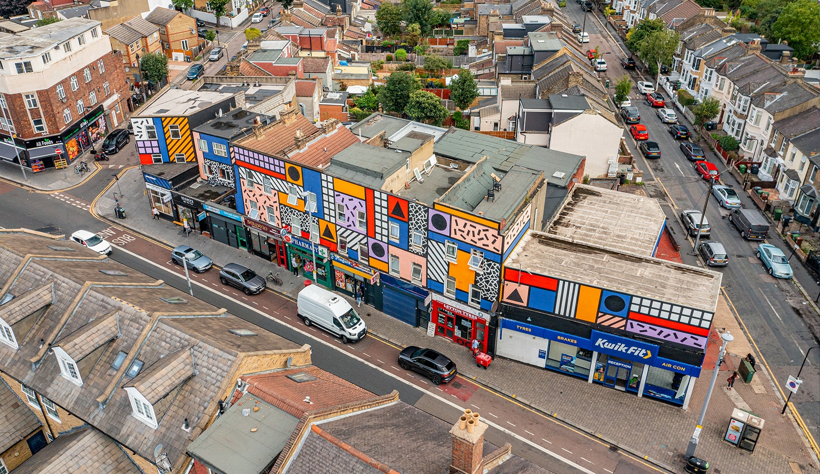 Aerial photo from a drone of Leyton High Street London, including Walala Parade artwork on building.