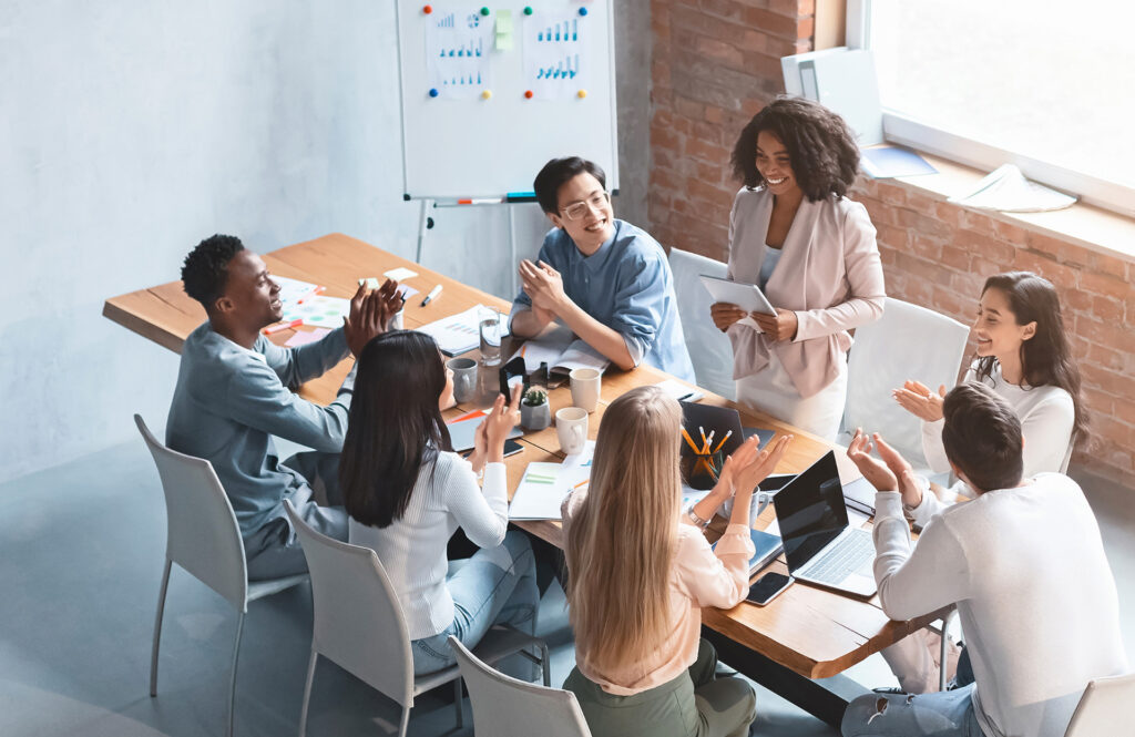 Team meeting around a table in a meeting room